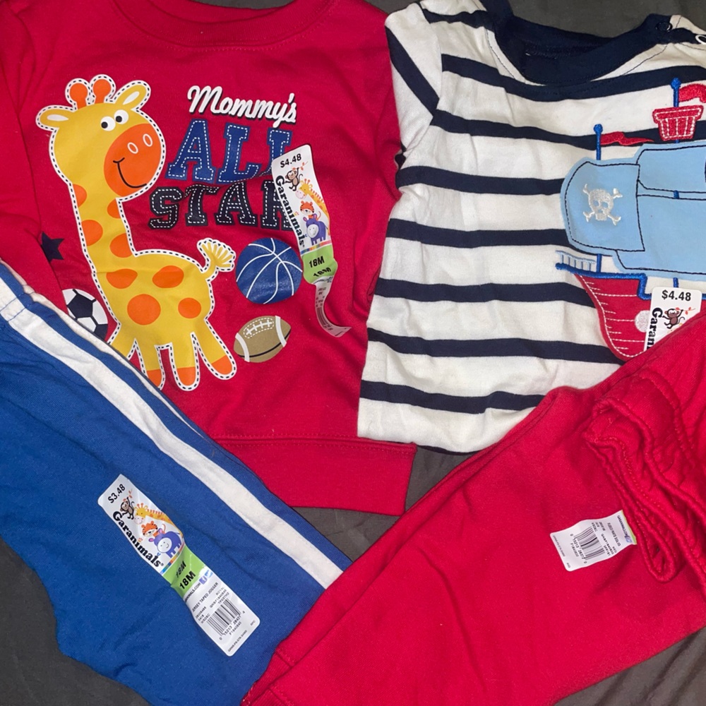 Brand new with tags - 2 tops , 2 pants 
Garanimals size 18 months